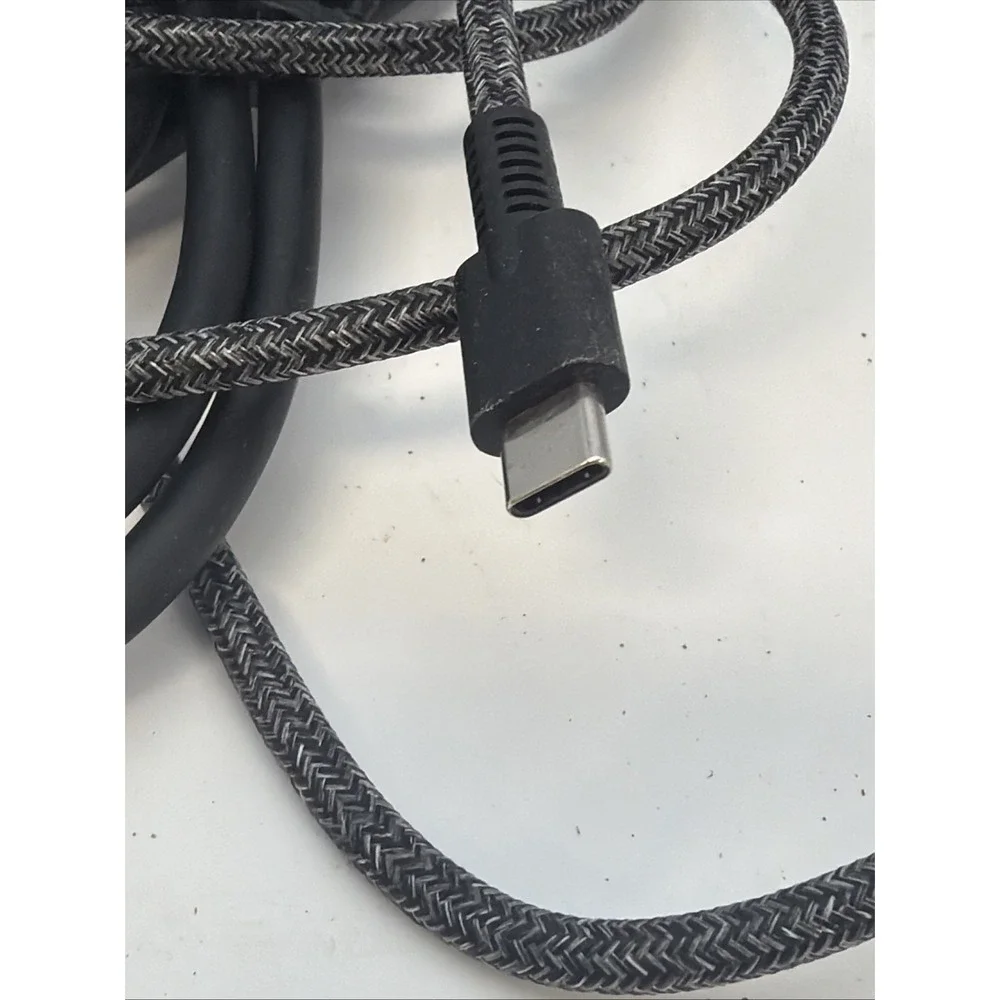 genuine HP 65W USB-C AC adapter.